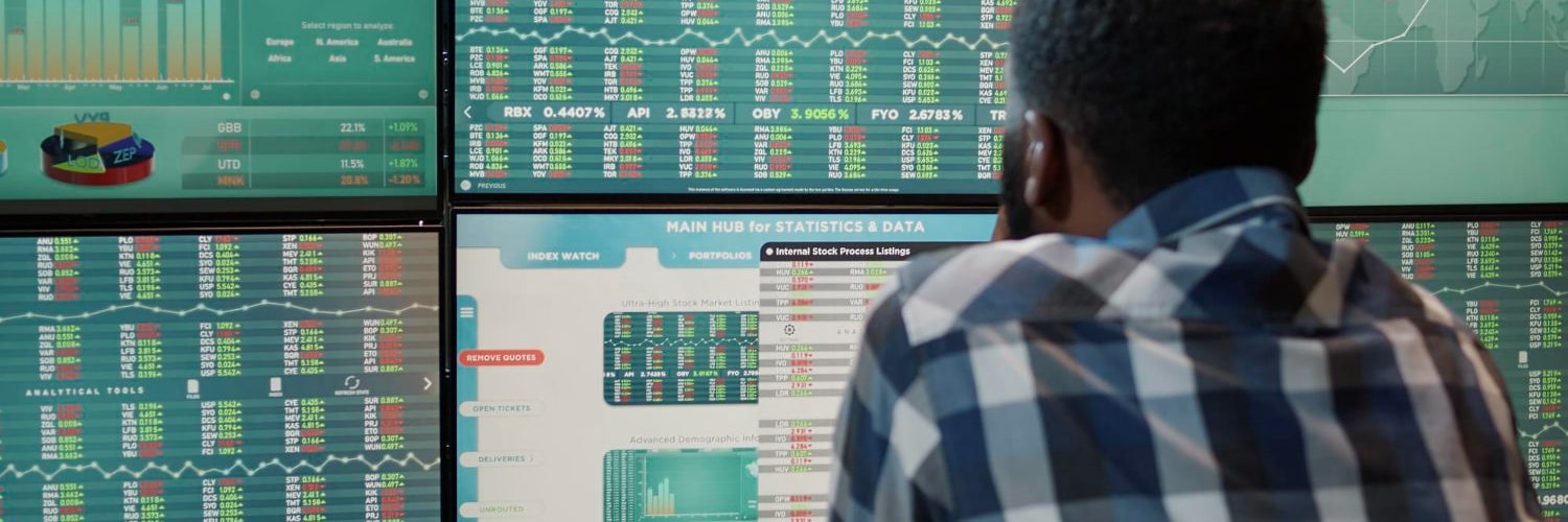 african-american-man-working-with-forex-market-exchange-multi-monitors-workstation-analyzing-stock-funds-capital-banking-sales-buy-sell-profit-money-financial-growth-min